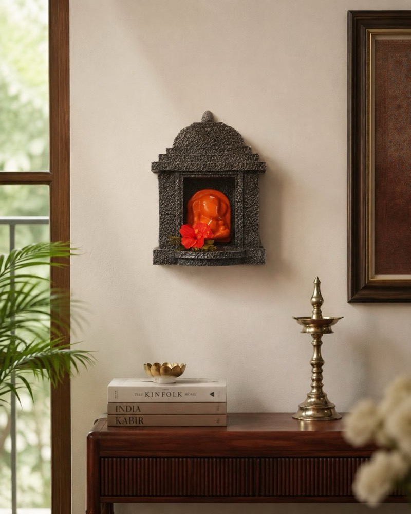 The temple mounted on a wall above a console table.